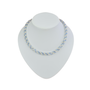 A delicate evening dress necklace with interlocking faceted clear and light blue crystal chain