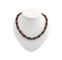 Beaded korallenkette rot with black lava rock beads and gold spacers as a statement stück necklace